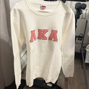 AKA Cream Sweater
Next chapter MTG w/ a blouse underneath